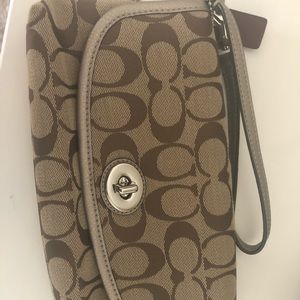 Medium Gold Coach wristlet